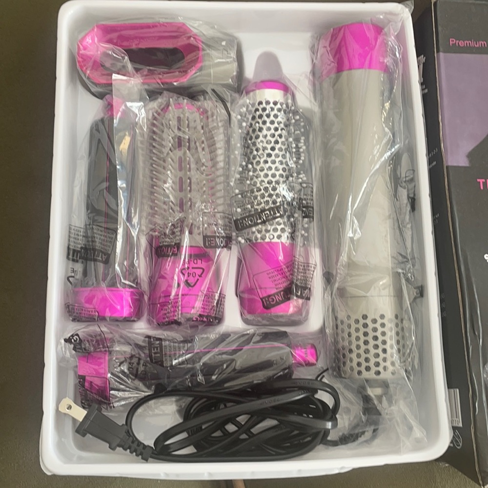5 in 1 hot air styler. NOT a DYSON. Similar to it.